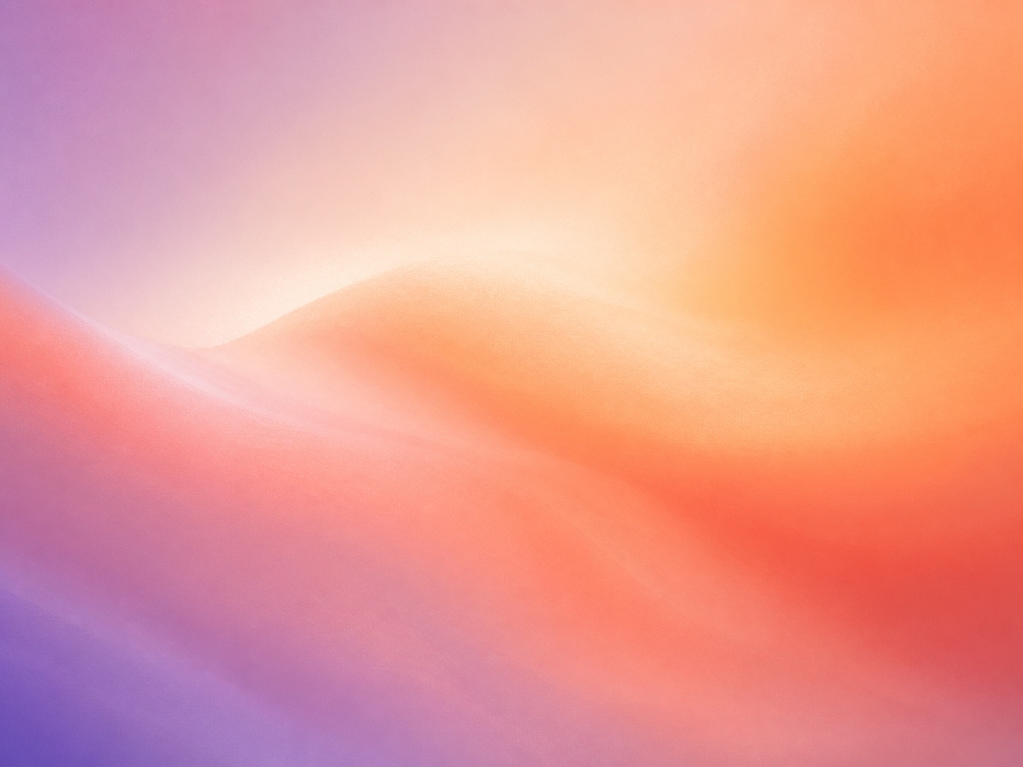 Soft coral, apricot, and lavender light blending across an abstract landscape